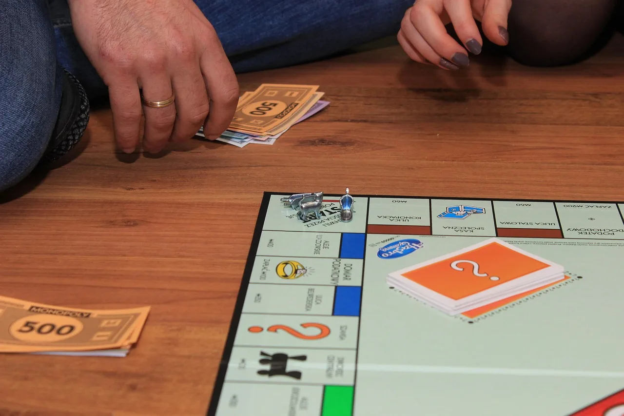 Monopoly board game being played